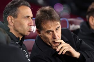 Julen Lopetegui talks to his assistant during West Ham