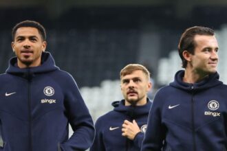 Levi Colwill, Ben Chilwell and Noni Madueke of Chelsea