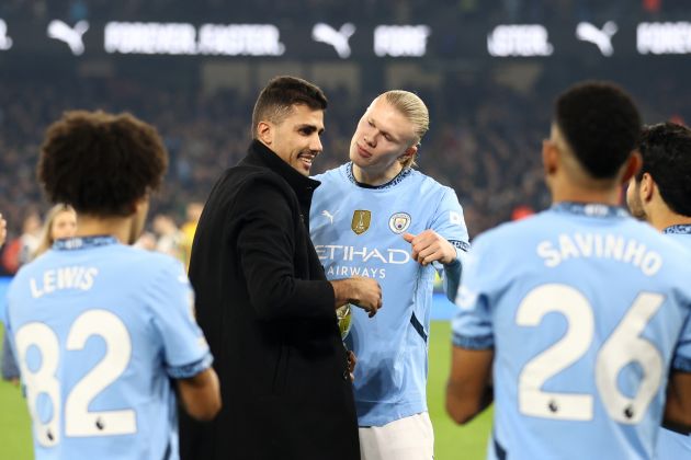 Rodri of Manchester City is congratulated by his team mates as he collects his Ballon d