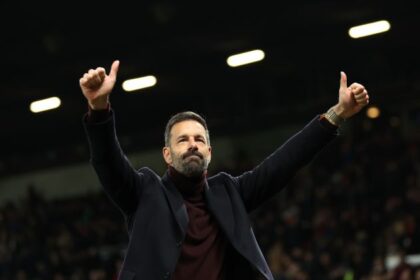 Ruud van Nistelrooy gestures to Manchester United fans