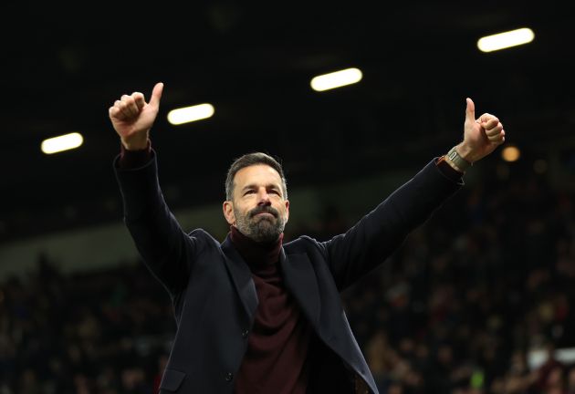 Ruud van Nistelrooy gestures to Manchester United fans