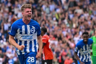 Evan Ferguson celebrates scoring against Luton Town at the AMEX Stadium in 2023.