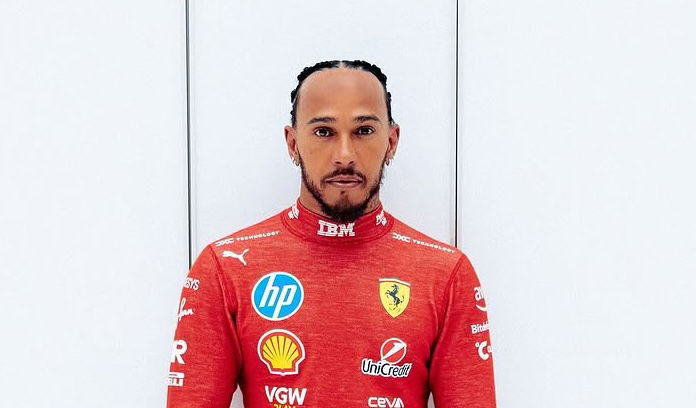 Lewis Hamilton shows off Ferrari red overalls