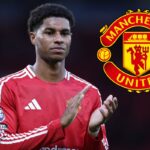 Marcus Rashford of Manchester United applauds fans with a dour expression after the Premier League match between Manchester United FC and Everton FC at Old Trafford