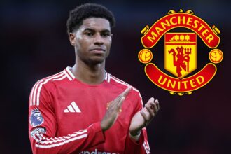 Marcus Rashford of Manchester United applauds fans with a dour expression after the Premier League match between Manchester United FC and Everton FC at Old Trafford