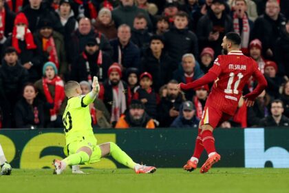 LIVERPOOL, ENGLAND - JANUARY 21: Mohamed Salah of Liverpool scores his team