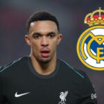 Trent Alexander-Arnold of Liverpool reacts with Real Madrid badge attached