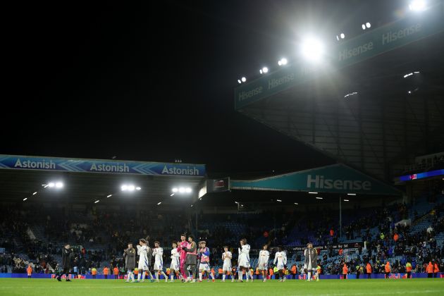 The Leeds United team applaud the fans