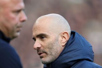 Enzo Maresca looks on prior to the Premier League match between Liverpool and Chelsea