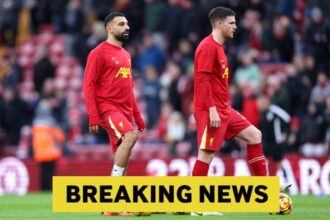 Mohamed Salah and Andrew Robertson warming up for Liverpool