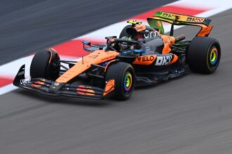 Norris on top after power cut delays F1 testing