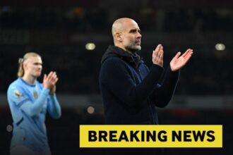 Pep Guardiola applauds the Manchester City fans