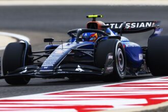 Sainz heads Hamilton as rain hits second day of F1 testing