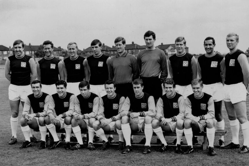 24th August 1964: Members of the West Ham United football team including John Bond (1st left, back row), Ken Brown (2nd left back row), Martin Peters (4th left, back row), Jim Standen (5th left, back row), Edward Bovington (2nd right, back row), Bobby Moore (1st right, back row), Alan Sealey (2nd left, front row), Ronnie Boyce (3rd left, front row), Johnny Byrne (4th left, front row) and Geoff Hurst (3rd right, front row). (Photo by Evening Standard/Getty Images)