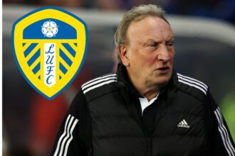 Neil Warnock with Leeds badge