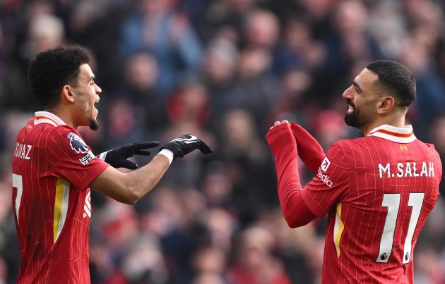 Mohamed Salah of Liverpool reacts with teammate Luis Diaz