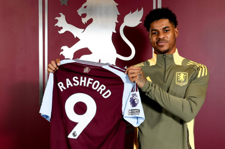 Marcus Rashford holding an Aston Villa shirt