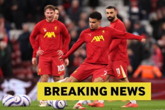 Luis Diaz warming up for Liverpool