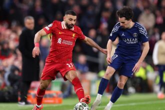 Mohamed Salah in action for Liverpool vs PSG