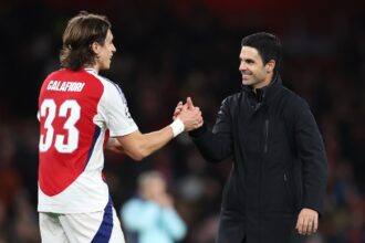 Riccardo Calafiori and Mikel Arteta with Arsenal