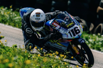 Teenage Northern Irish racer takes on Marc Marquez in Moto3 training session