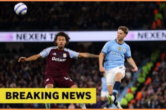 James McAtee in action for Man City