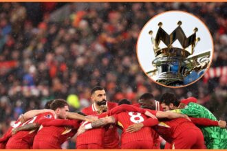 Liverpool players in a pre-match huddle