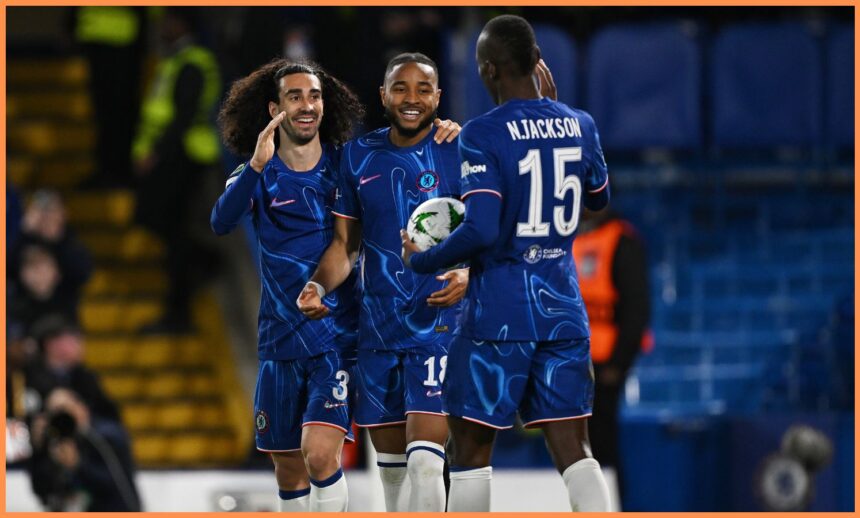 Christopher Nkunku celebrates with Marc Cucurella and Nicolas Jackson