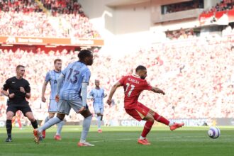 Mohamed Salah scores for Liverpool against Tottenham