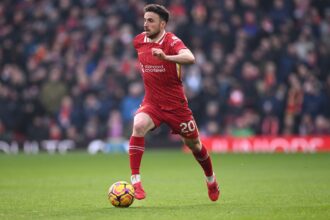 Diogo Jota runs with the ball