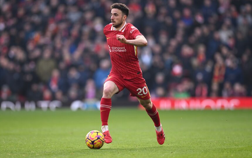 Diogo Jota runs with the ball