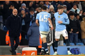 John Stones being subbed on by Manchester City