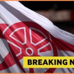 Arsenal flag at the Emirates Stadium with yellow