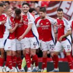 Arsenal players celebrate against Brentford at the Emirates Stadium