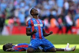 Marc Guehi celebrates after Crystal Palace beat Manchester City in the FA Cup final