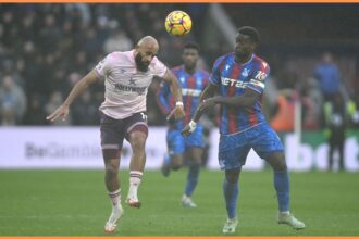 Bryan Mbeumo and Marc Guehi in action