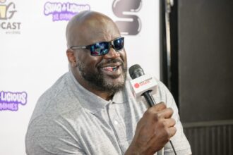 Shaquille O'Neal expressed doubts over Marcus Smart's ability to defend against one NBA player, Magic Johnson disagreed