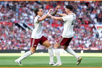 Riccardo Calafiori celebrates after scoring for Arsenal against Manchester United