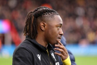 Eberechi Eze in the pre-match warm-up with Crystal Palace