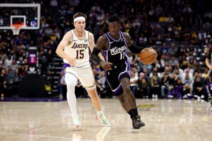 Dennis Schröder #17 of the Sacramento Kings is guarded by Austin Reaves #15 of the Los Angeles Lakers during the first quarter at Golden 1 Center on October 26, 2025 in Sacramento, California.