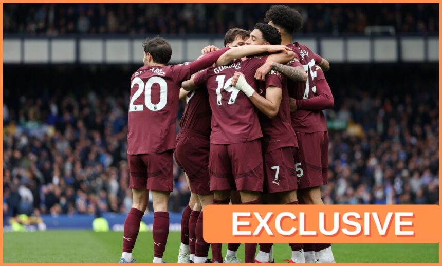 Manchester City players celebrating last season