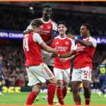 Arsenal players celebrate during the win over Atletico Madrid