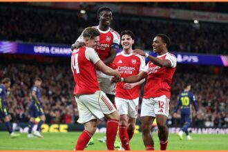 Arsenal players celebrate during the win over Atletico Madrid