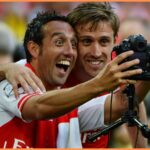 Santi Cazorla celebrates with Nacho Monreal