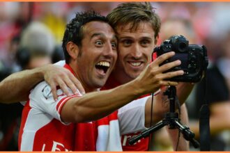 Santi Cazorla celebrates with Nacho Monreal