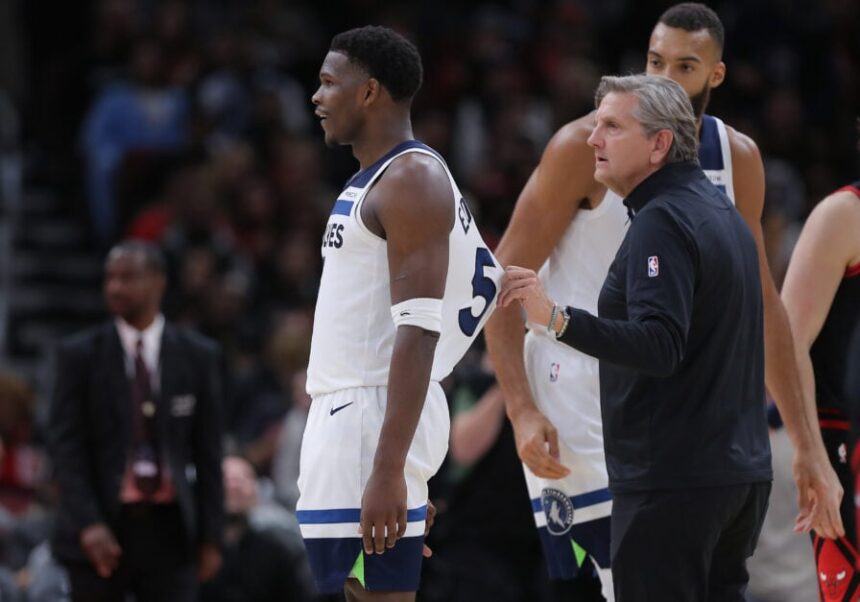 Minnesota Timberwolves head coach Chris Finch and Minnesota Timberwolves guard Anthony Edwards (5) during the second half against the Chicago Bulls on November 7, 2024 at the United Center in Chicago, Illinois.