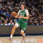 Cooper Flagg #32 of the Dallas Mavericks handles the ball during a game against the Toronto Raptors at American Airlines Center on October 26, 2025 in Dallas, Texas.