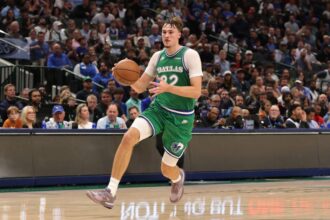Cooper Flagg #32 of the Dallas Mavericks handles the ball during a game against the Toronto Raptors at American Airlines Center on October 26, 2025 in Dallas, Texas.
