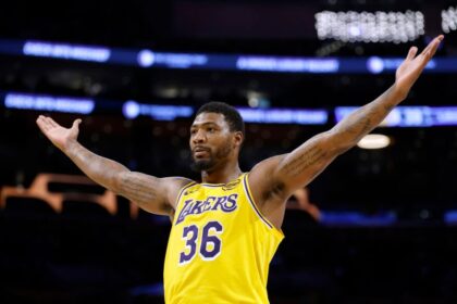 Marcus Smart #36 of the Los Angeles Lakers reacts for a foul after his basket during a 119-109 Warriors win in the season opening game between the Golden State Warriors and the Los Angeles Lakers at Crypto.com Arena.