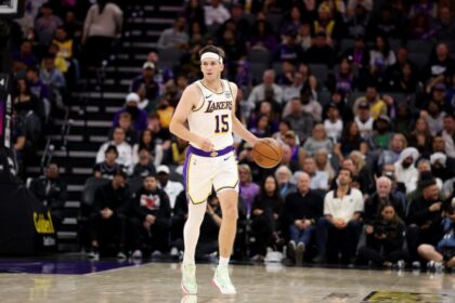 Austin Reaves #15 of the Los Angeles Lakers dribbles the ball against the Sacramento Kings at Golden 1 Center on October 26, 2025 in Sacramento, California. Reaves finished with a career high 51 points.